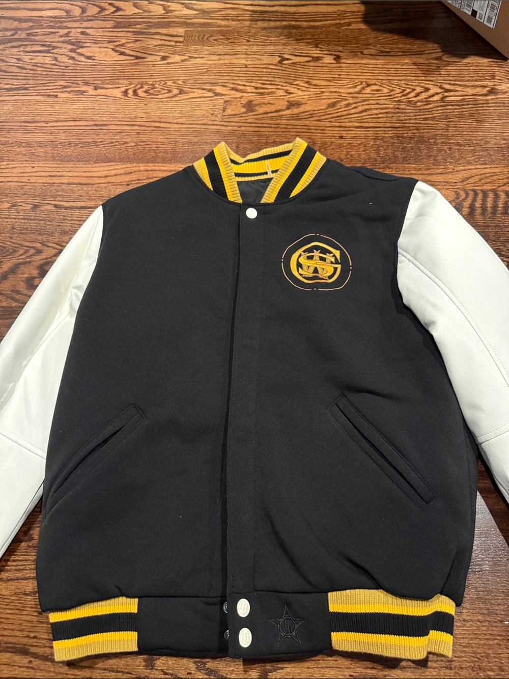 Reversible NBA Black and White Varsity Jacket with Yellow Trim